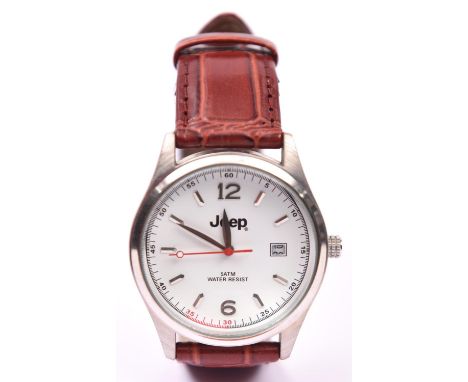 A Jeep quartz watch with date display and brown leather strap. With case and instruction leaflet. Watch purchased in 2009. VG
