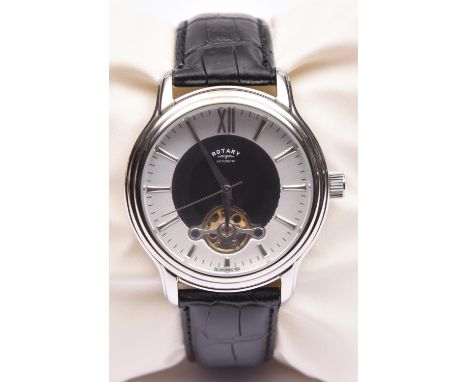 A Rotary Automatic watch with automatic self winding movement. Metallic face and numeral markers with open balance wheel. Rot
