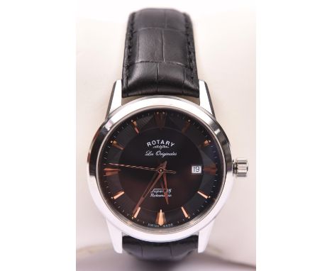 A Rotary Les Originals Super 25 Rotamatic watch with automatic self winding movement.Black face and gold numeral markers. Wit