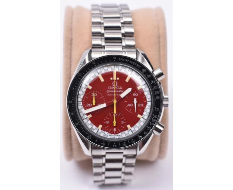 An Omega Speedmaster Automatic with automatic winding mechanism. Stainless steel case and bracelet, red face and yellow numer