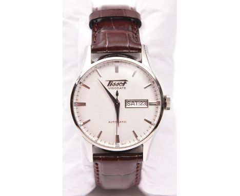 A Tissot Automatic Visodate watch with automatic self winding mechanism. Stainless steel case, metallic face and numeral mark