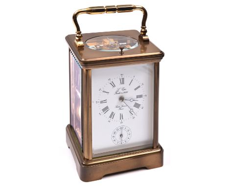 A modern L'Epee, France brass carriage clock. A repeater clock with separate alarm dial below main dial. Double spring barrel