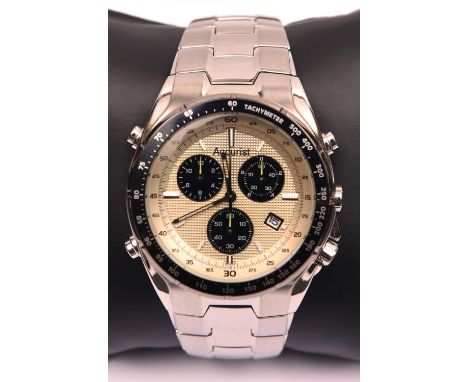 An Accurist Skymaster Chronograph watch with quartz movement. Metallic face with three additional dials. With case and instru