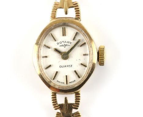 Rotary, a ladies wristwatch, oval dial with baton hour markers, quartz movement, in a 9 ct yellow gold case and integrated br