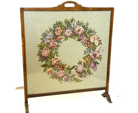 20th century tapestry fire screen, decorated with floral wreath, initialled MC and dated 1968 lower right, 100 x 87cm