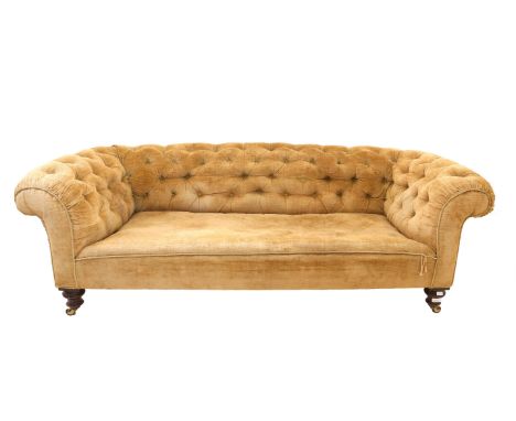 Chesterfield sofa with button back mustard velvet upholstery, on turned mahogany feet and castors, H60 x W195 x D90cm 