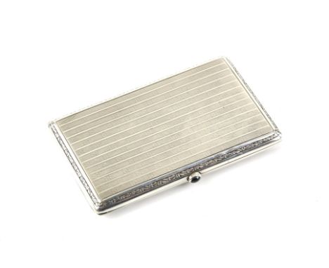 Engine turned bright cut silver case with import marks, S and Co London 1926, with a blue sapphire button to open the caseCon