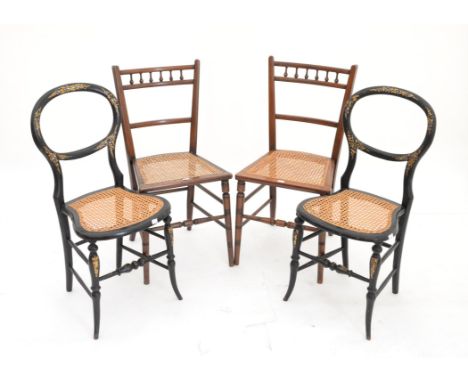 Pair of Victorian ebonised mother of pearl inlaid balloon back chairs with caned seats, together with two mahogany chairs wit