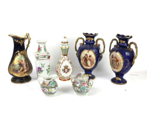 Various ornamental ceramic and resin figurines including Katherine by Leonardo, along with two blue twin handled urn vases, a