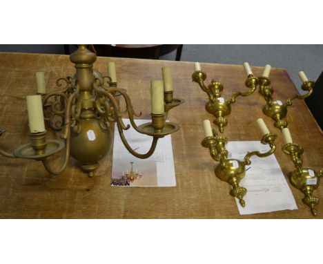 A six branch brass pendant light fitting; and a set of four brass two-branch wall lights 