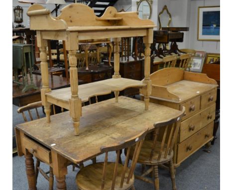 A Victorian pine washstand; a chest of drawers; a pine drop leaf table; and four pine stick back chairs 