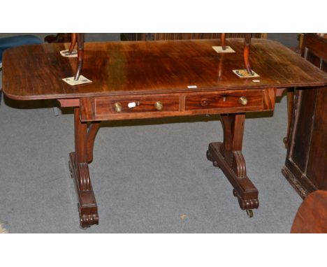 A mahogany sofa table fitted with two drawers