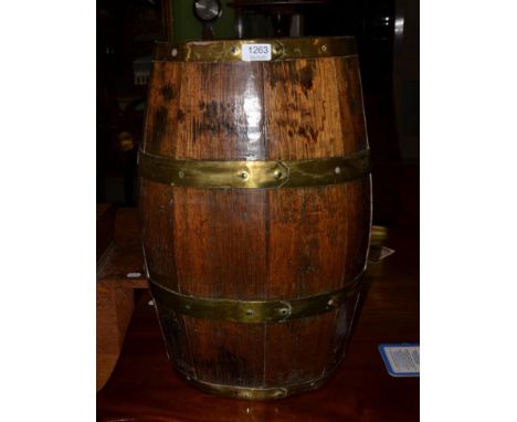 A coopered oak barrel form stick stand
