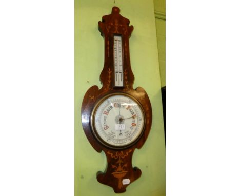 A mahogany inlaid aneroid barometer