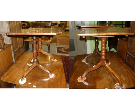 Two 19th century mahogany tilt top tripod tables on down swept supports 
