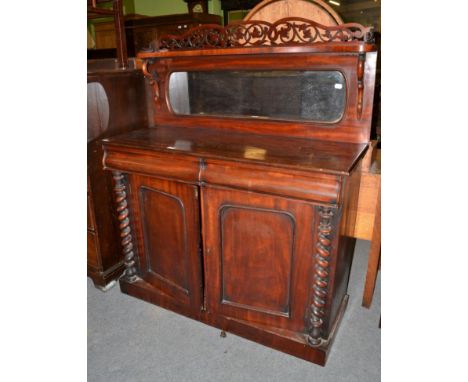 A Victorian mahogany mirror-back chiffonier, 3rd quarter 19th century, with fret carved pediment above a serpentine shelf and