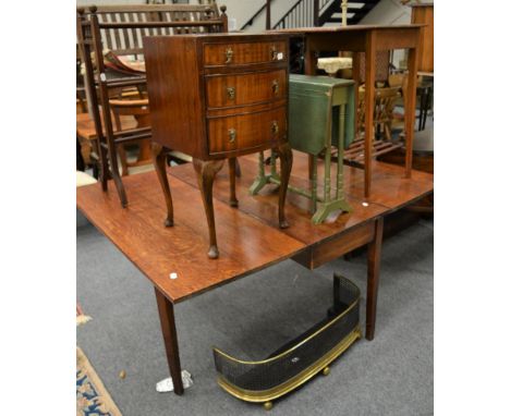 A 19th century oak drop leaf dining table; a painted Sutherland table; a 19th century mahogany tripod table; a towel rail; an