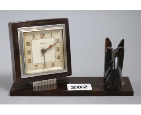 A French Art Deco bakelite alarm clock with scottie dog height 10cm