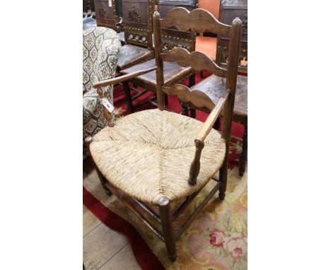 An early 19th century French ash ladder back chair