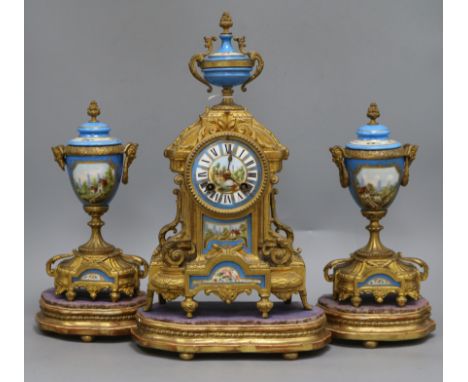 A French porcelain and ormolu clock garniture on stand overall height 39cm
