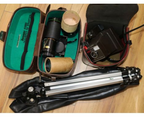 A collection of vintage cameras and equipment