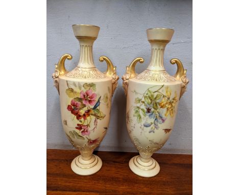 A pair of Royal Worcester blush ivory twin handled vases numbered 1759, 26.5cm h Location: 