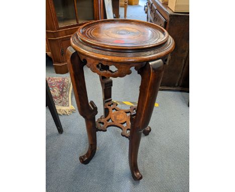 A 20th century Chinese two tier jardiniere stand on four legs with pierced shelf below 85cm h x 42cm w Location: 