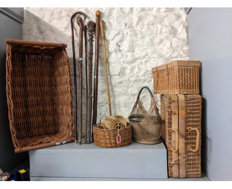A quantity of vintage walking sticks and basketsLocation: LWB 