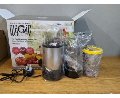 A magic Bullet food processing system, as newLocation: G 