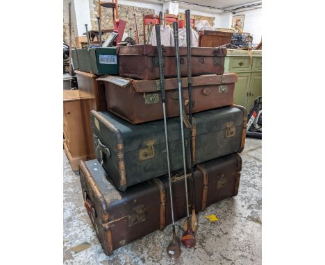 Four vintage trunks and cases to include two canvas bentwood trunks, together with vintage golf clubsLocation: 