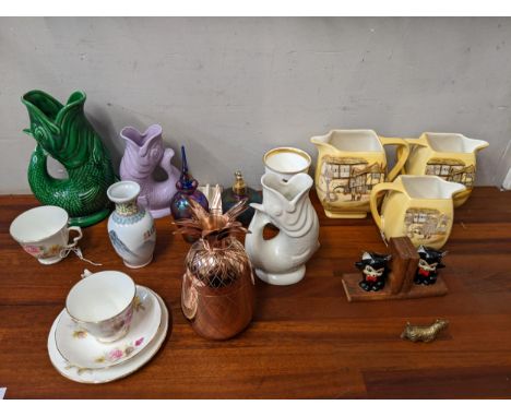 Ceramics and glass to include glug glug jugs, a Minton commemorative cup tea ware, an iridescent scent bottle and other items