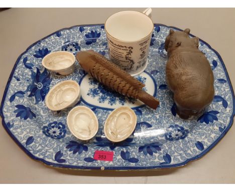 Four Victorian cream glazed moulds, a large early 20th century blue and white meat dish, a Royal Worcester 1879-1979 commemor