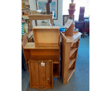 A low oak bookcase together with a small pine corner wall shelf unit, a modern pine box, a vintage pine tray and a wooden tab