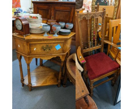 A reproduction oak single drawer inset corner two tier table, 76cm h x 72cm w, together with an Ercol Old Colonial armchairLo