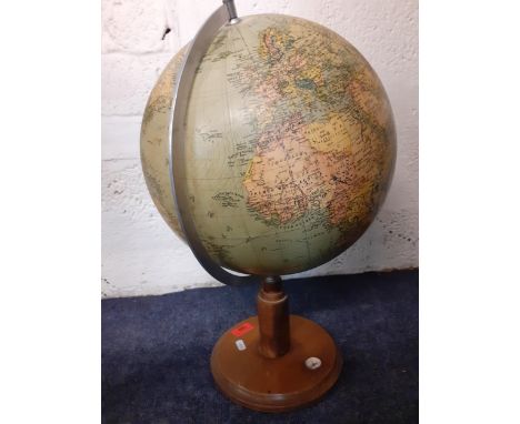 An early 20th century terrestrial globe by James Wellsworth & Co, on an oak stepped base with inset compass, 53cm tallLocatio