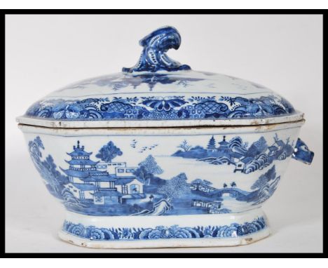 An early 18th century Chinese blue and white large tureen and lid having chinoiserie decoration with foo dog (one missing) ha