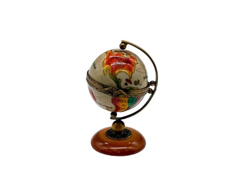 Hand painted mini globe placed on a brown base. 'Limoges France Peint Main SD' on the inside. 'Limoges France Peint Main Excl