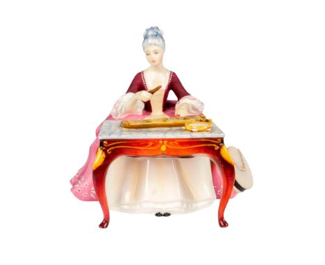 Limited edition in matte finish modeled as a woman in a pink and white dress sitting at a table playing a dulcimer. The Music