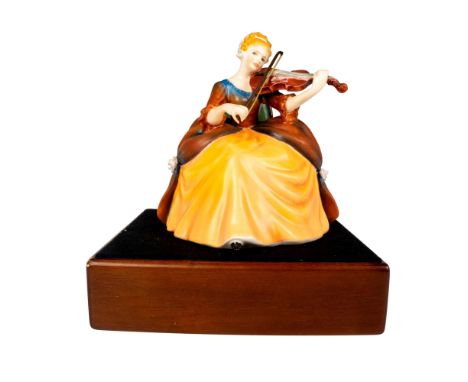 Limited edition in matte finish part of the Lady Musicians series. She wears a brown and gold 18th-century gown while playing