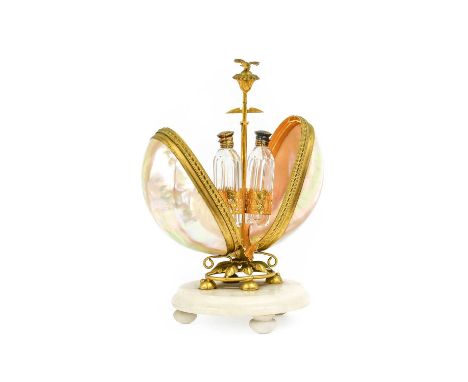 A French Palais Royal-Type Gilt Metal Mounted Mother-of-Pearl Scent Casket, circa 1870, with bird finial, the hinged bi-valve