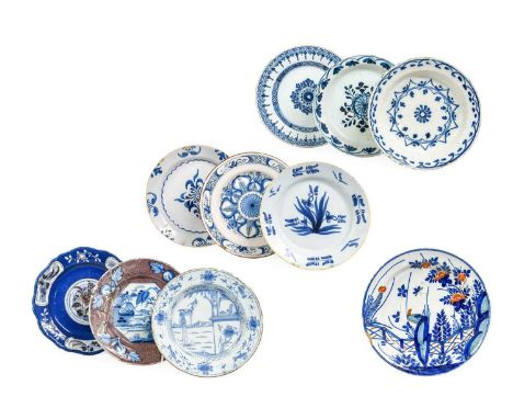 A Liverpool Delft Plate, circa 1750, Kangxi style, with red line rim and painted in blue with figures 21cm diameter Six Vario