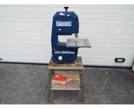 A Draper 9" two wheel bandsaw on stand, approximately 140 cm x 64 cm x 39 cm.