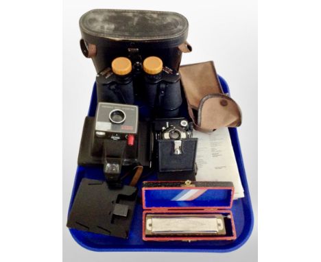 A pair of Tecnar 16 x 50 binoculars together with a Penguin camera, Polaroid land camera, Hohner mouth organ etc 