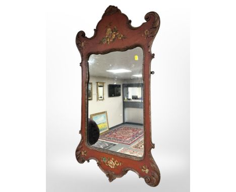 A 19th century painted mirror in the Chippendale style, 102cm by 58cm