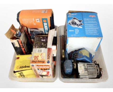 Two crates of assorted power tools, Black and Decker jigsaw, circular saw, inspection lamp etc 