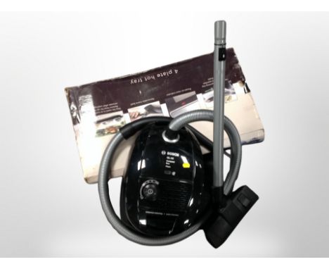 A Bosch compact vacuum and Russell Hobbs hot tray in box 