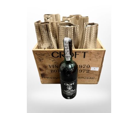 A wooden crate containing ten bottles of Croft 1970 vintage port CONDITION REPORT: This crate was originally complete but was