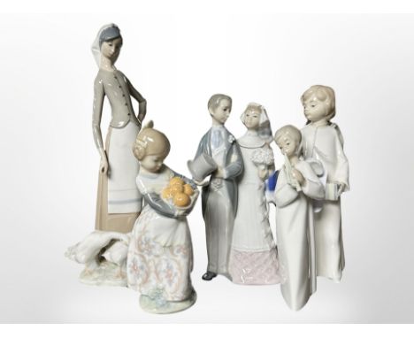 A Lladro figure of a Bride and Groom, further Lladro figure of a lady with Geese, two Nao figures and another Spanish figure 