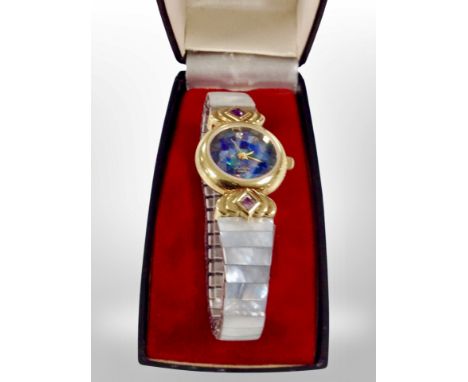 A lady's watch with opal and mother of pearl 