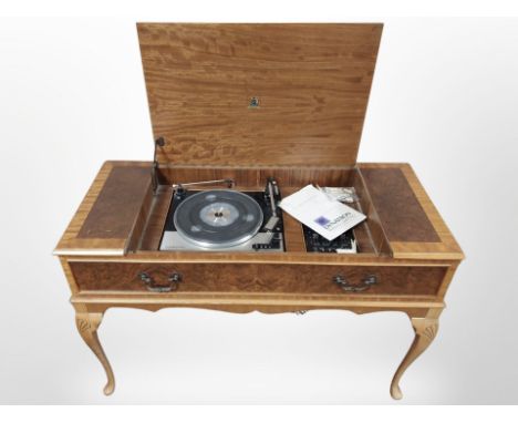 A Dynatron record player in cabinet, with Garrard Mk IV turntable, together with a further reproduction record cabinet (2)